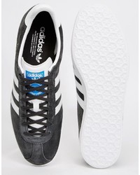 graue Leder Turnschuhe von adidas