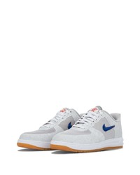 graue niedrige Sneakers von Nike