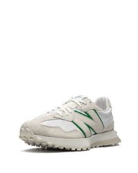 graue Sportschuhe von New Balance