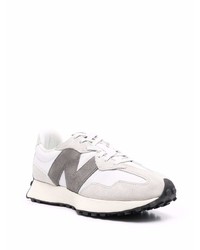 graue Sportschuhe von New Balance