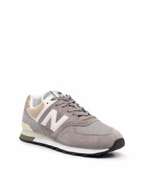 graue Sportschuhe von New Balance