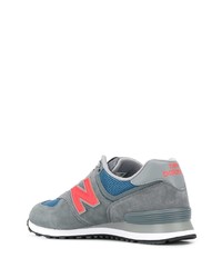 graue Sportschuhe von New Balance