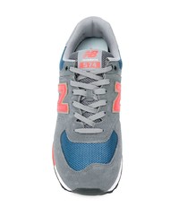 graue Sportschuhe von New Balance