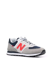 graue Sportschuhe von New Balance