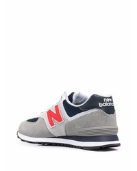 graue Sportschuhe von New Balance