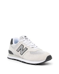 graue Sportschuhe von New Balance