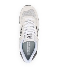 graue Sportschuhe von New Balance