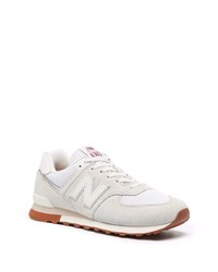 graue Sportschuhe von New Balance