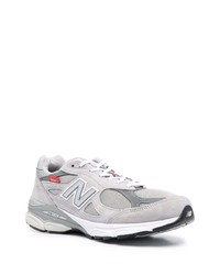 graue Sportschuhe von New Balance