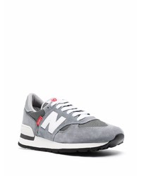 graue Sportschuhe von New Balance