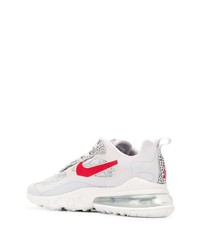 graue Sportschuhe von Nike