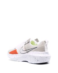 graue Sportschuhe von Nike