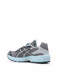 graue Sportschuhe von Asics