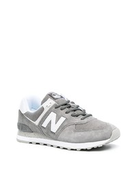 graue Sportschuhe von New Balance