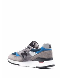 graue Sportschuhe von New Balance