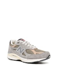 graue Sportschuhe von New Balance