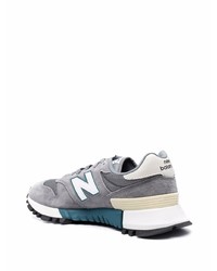 graue Sportschuhe von New Balance