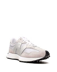 graue Sportschuhe von New Balance