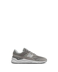 graue Sportschuhe von New Balance