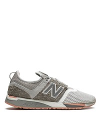 graue Sportschuhe von New Balance