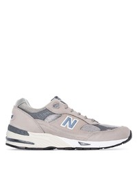 graue Sportschuhe von New Balance