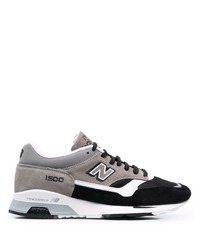 graue Sportschuhe von New Balance