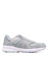 graue Sportschuhe von New Balance