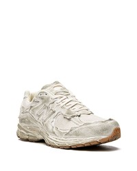 graue Sportschuhe von New Balance