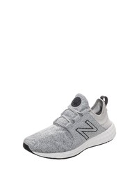 graue Sportschuhe von New Balance