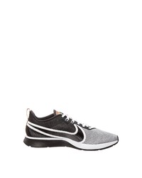 graue Sportschuhe von Nike