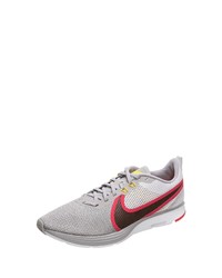 graue Sportschuhe von Nike