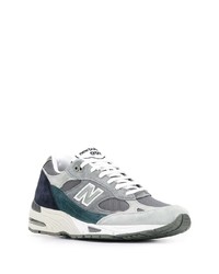 graue Sportschuhe von New Balance