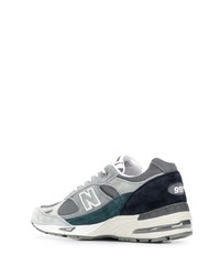 graue Sportschuhe von New Balance