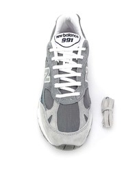 graue Sportschuhe von New Balance