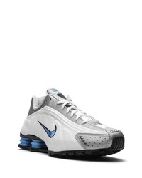 graue Sportschuhe von Nike