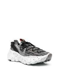 graue Sportschuhe von Nike