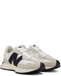 graue Sportschuhe von New Balance