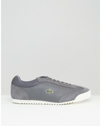 graue Turnschuhe von Lacoste