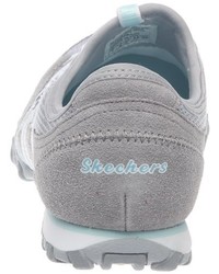 graue Turnschuhe von Skechers