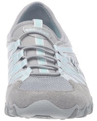 graue Turnschuhe von Skechers