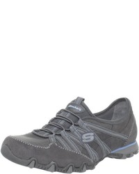 graue Turnschuhe von Skechers