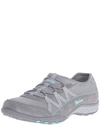 graue Turnschuhe von Skechers