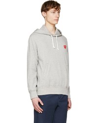 grauer bedruckter Pullover mit einem Kapuze von Comme Des Garcons Play