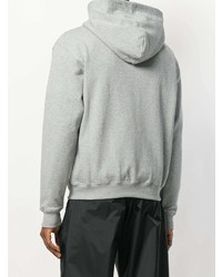 grauer bedruckter Pullover mit einem Kapuze von Balenciaga