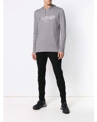 grauer bedruckter Pullover mit einem Kapuze von Balmain