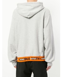 grauer bedruckter Pullover mit einem Kapuze von Heron Preston