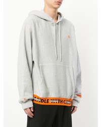 grauer bedruckter Pullover mit einem Kapuze von Heron Preston