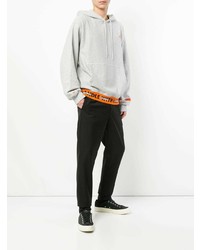 grauer bedruckter Pullover mit einem Kapuze von Heron Preston