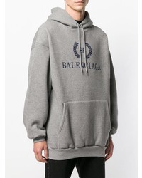 grauer bedruckter Pullover mit einem Kapuze von Balenciaga