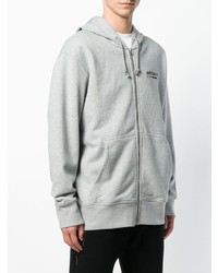 grauer bedruckter Pullover mit einem Kapuze von adidas